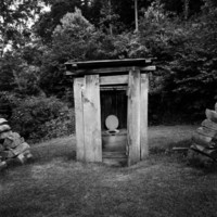 Lawrence's back yard outhouse