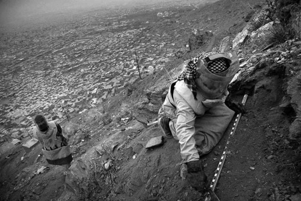 The environment in the mine fields is not always optional. The deminer work slowly and methodically in order to ensure the safety on site. Each lane is quality controlled by the section leader. TV-Hill in Kabul : Demining in Kabul : Charlotte Oestervang Photography