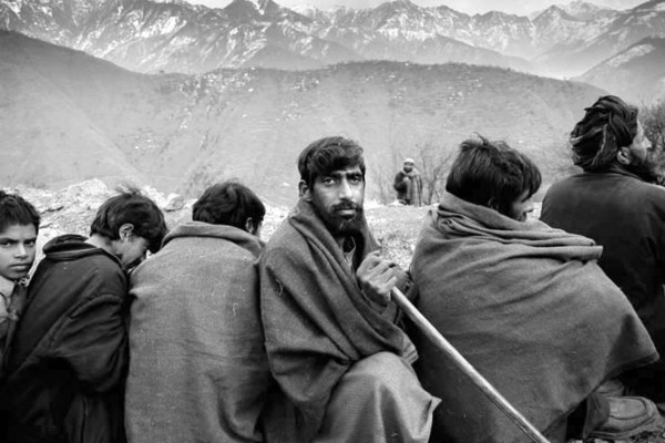 Earthquake survivors queing up for metal sheets in mountain village Kot : Short Stories : Charlotte Oestervang Photography
