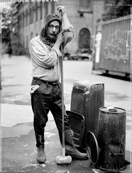 The Woodtroll Niels lives on the Rabbit Mountain in an old military shed where he has put up a sign saying he is looking for a wife. Niels is keeping the area around the vegetable store clean : Freetown Christiania : Charlotte Oestervang Photography